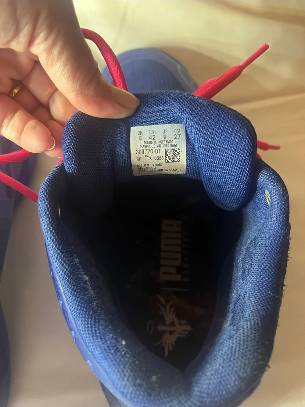 Puma mens Melo Athletic Shoes in Blue with Pink Laces